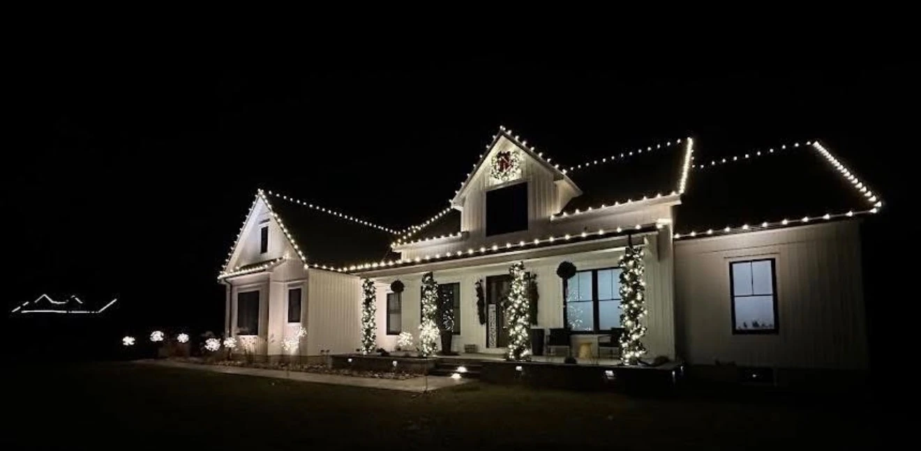 Roofline glow on a home at night